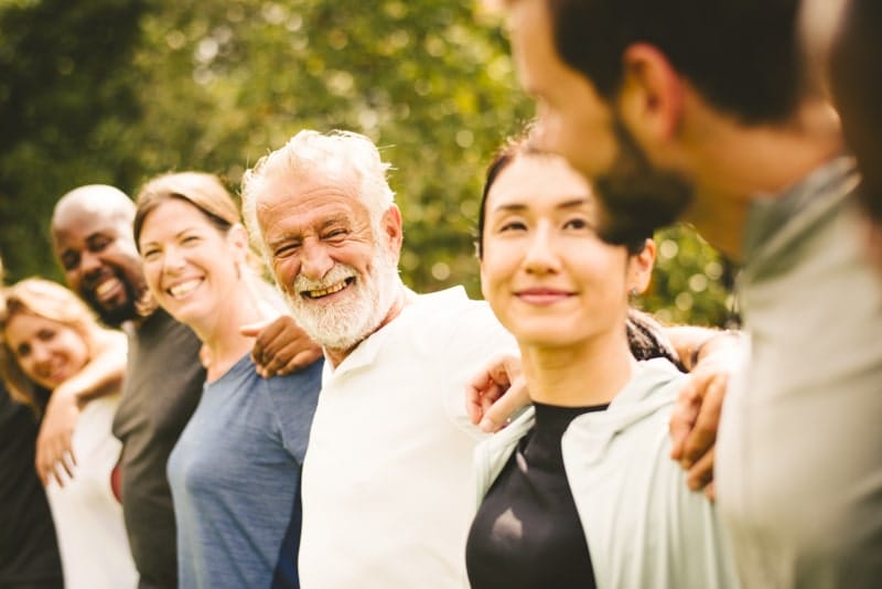Happy diverse people together in the park